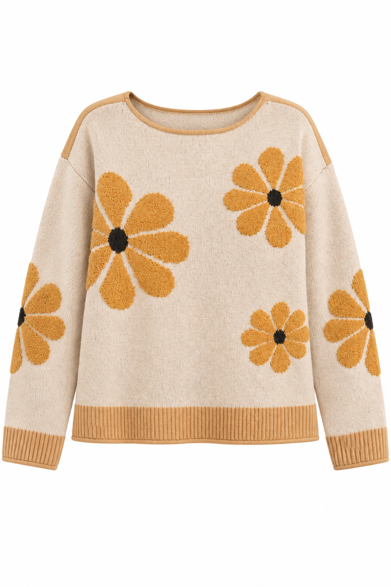 Trestles Clothing Company beige ribbed sweater featuring oversized tufted yellow daisy flowers and a crew neckline.
